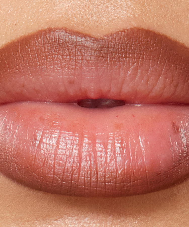 | desc: | text: light Lip Sculpt in shade Suede