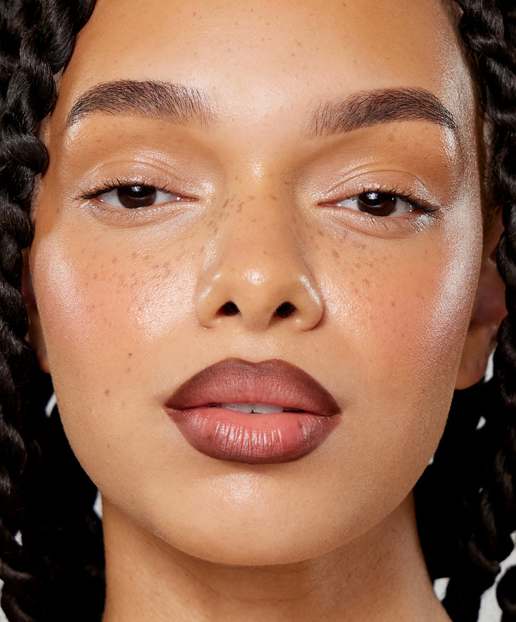 | desc: | text: light Gabbi wears Lip Sculpt in Sepia